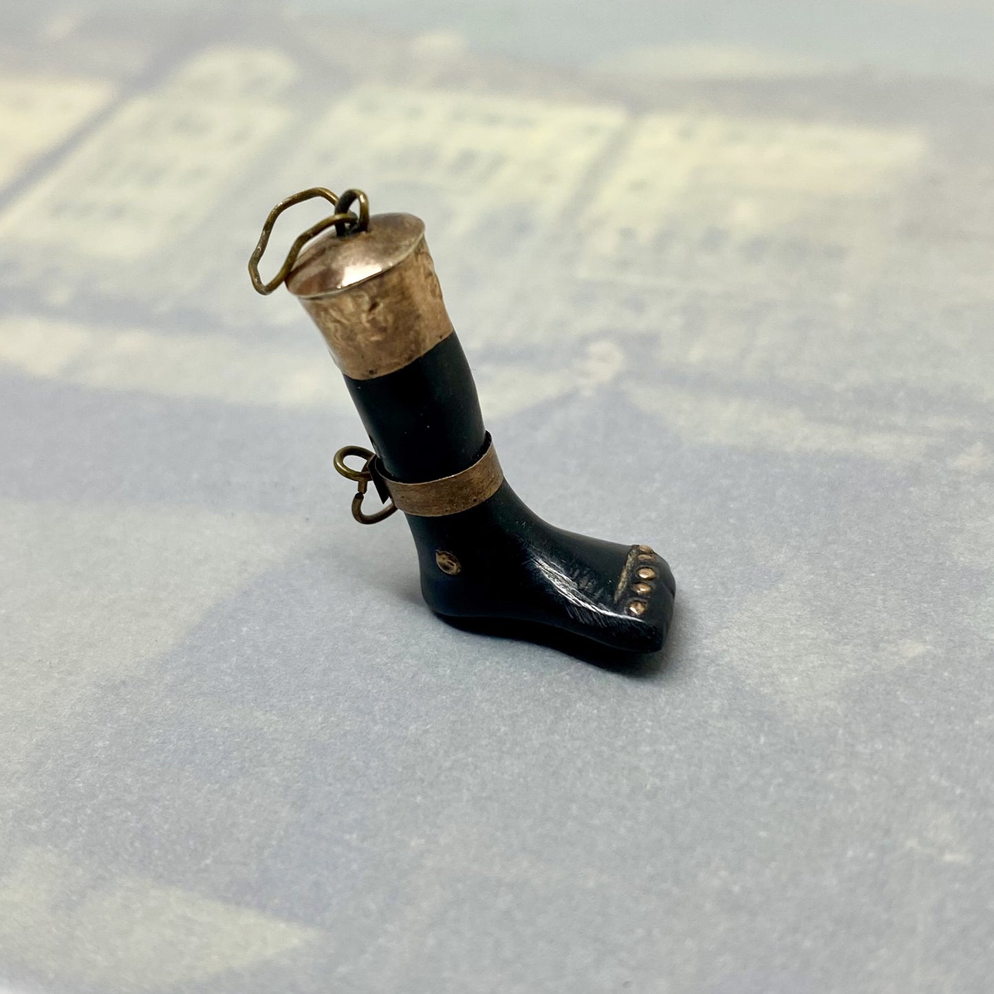 Antique 9k Gold Stained Horn Ex Voto Foot Pendant